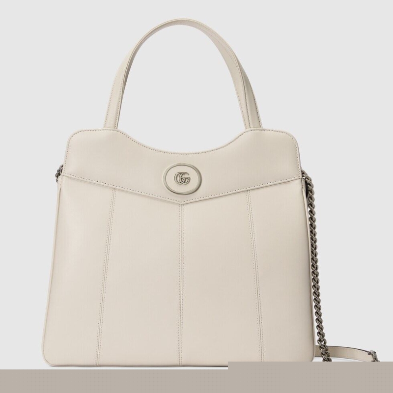 G*u*i top handle bags
